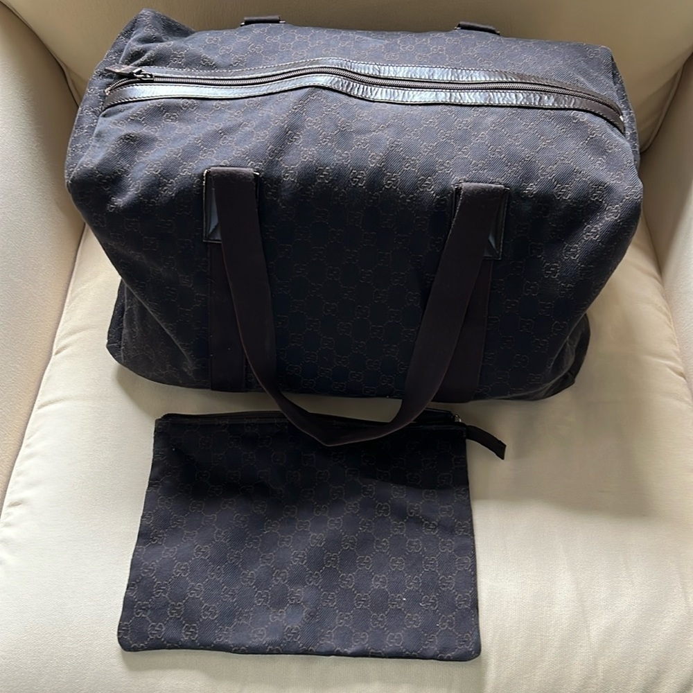 Authentic Gucci monogrammed large weekender duffle bag w/ matching pouch